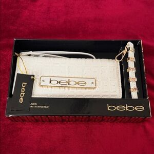 Bebe Ivory Wristlet with Metallic Details